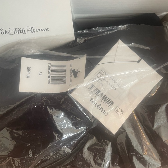 SOLD
NWT Black Slip Dress V neck size Small Toteme Spring - Picture 5 of 7